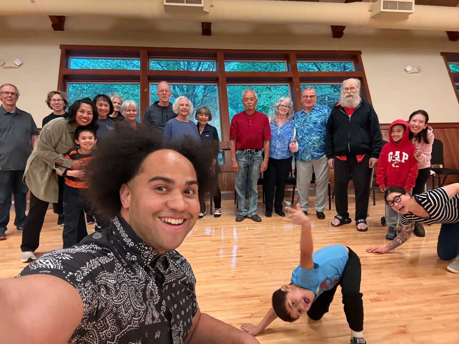 A group photo of students and instructors after a free Lindy Hop class at the SeaTac Community Center